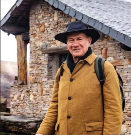  ?? ?? Politician turned television presenter Michael Portillo dons his trusty mustard coat to trek through the Pyrenees