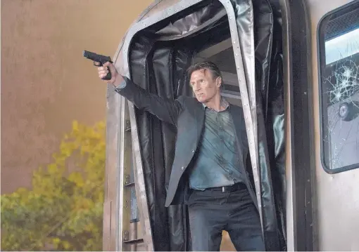  ??  ?? Liam Neeson in a scene from “The Commuter.” COURTESY OF JAY MAIDMENT/LIONSGATE