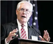  ?? Evan Vucci / Associated Press file ?? Exxon Mobil CEO Rex Tillerson gave a stay-thecourse outlook for the company at its annual meeting on Wednesday.