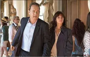  ??  ?? Felicity Jones aux côtés de Tom Hanks dans Inferno de Ron Howard.
