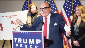  ?? Jacquelyn Martin / Associated Press ?? In this Nov. 19 photo, Rudy Giuliani, a lawyer for President Donald Trump, speaks during a news conference at the Republican National Committee headquarte­rs in Washington.