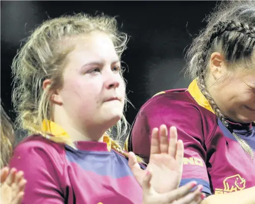  ??  ?? &gt; Cardiff Met players feel the emotion of the tribute during last night’s minute’s round of applause in tribute to Elli Norkett, who was killed in a car crash on February 25