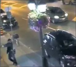  ??  ?? HORRIBLE: The Batman-obsessed “kook” who fired into a Toronto street crowd Sunday night was caught on video targeting terrified innocents.