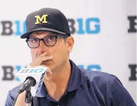  ?? ANNIE RICE/ASSOCIATED PRESS ?? Coach Jim Harbaugh has his Michigan Wolverines ranked fourth in the nation, but Maize and Blue fans won’t be happy until he finally beats Ohio State.