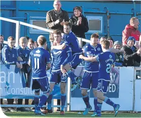  ??  ?? Nikolay Todorov scores for Queen of the South to make it 3-3