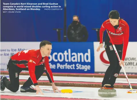  ?? WCF / CÉLINE STUCKI PHOTO COURTESY OF ?? Team Canada's Kerri Einarson and Brad Gushue compete in world mixed doubles curling action in Aberdeen, Scotland on Monday.