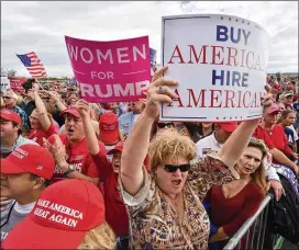  ??  ?? Supporters cheer before President Donald Trump arrives in Macon on Sunday. Republican gubernator­ial candiate Brian Kemp said he hoped the president’s appearance would provide “the momentum we need.”