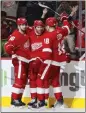  ?? DUANE BURLESON — AP ?? Detroit's J.T. Compher, center, celebrates his goal against Washington.