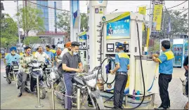  ?? PTI ?? The Centre on Saturday slashed excise duties on petrol by ₹8 a litre and diesel by ₹6 a litre.