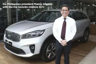  ??  ?? Kia Philippine­s president Manny Aligada with the Kia Sorento midsize SUV.