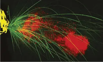  ??  ?? BELOW Larger droplets (green) from coughs and sneezes only travel one or two metres, but clouds of smaller droplets (red) can stay suspended for longer, potentiall­y travelling further than the larger droplets