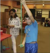  ?? WILLIAM ROLLER PHOTO ?? Dameon Hurtado, student in the STEAM class shows off his slime kit creation Wednesday at the Camarena Memorial Library in Calexico.