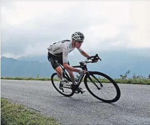  ?? CHRISTOPHE ENA THE ASSOCIATED PRESS ?? Chris Froome speeds down Col de Val Louron-Azet pass in Wednesday’s Tour de France stage.