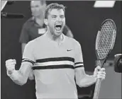  ?? PAUL CROCK/GETTY ?? No. 3 seed Grigor Dimitrov is fired up Wednesday after rallying to defeat Mackenzie McDonald in five sets.