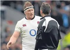  ??  ?? England captain Dylan Hartley seeks clarificat­ion from referee Romain Poite during Sunday’s game with Italy.