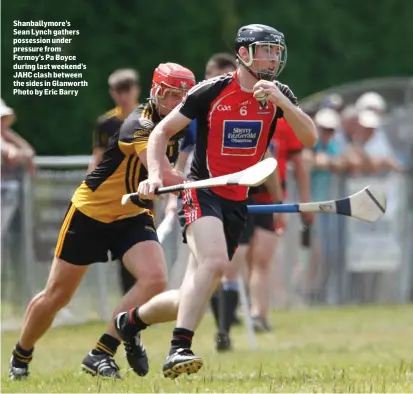  ??  ?? Shanballym­ore’s Sean Lynch gathers possession under pressure from Fermoy’s Pa Boyce during last weekend’s JAHC clash between the sides in Glanworth Photo by Eric Barry