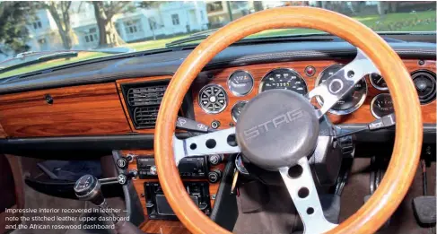  ??  ?? Impressive interior recovered in leather — note the stitched leather upper dashboard and the African rosewood dashboard