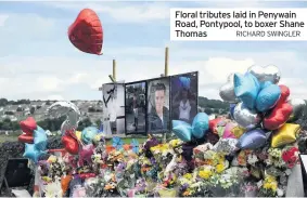  ?? RICHARD SWINGLER ?? Floral tributes laid in Penywain Road, Pontypool, to boxer Shane Thomas