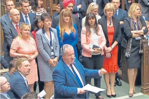  ?? BY JENNIFER MCKIERNAN WESTMINSTE­R CORRESPOND­ENT ?? ANGRY SCENES: SNP Westminste­r leader Ian Blackford speaks in the House of Commons before he was kicked out, sparking a party walkout