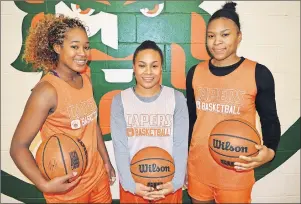  ?? T.J. COLELLO/ ?? Graduating Cape Breton Capers women’s basketball team members, from left, Natasha Roach, Jalynn Skeir and Colleen Keane will play for the final time at Sullivan Fieldhouse this weekend when CBU wraps up its regular season against the Saint Mary’s...