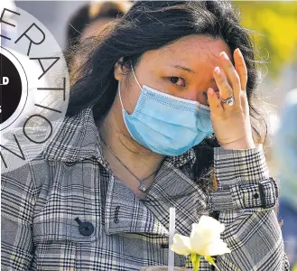  ?? DAMIAN DOVARGANES/ASSOCIATED PRESS ?? Esther Song tears up as she attends a Los Angeles rally in February to raise awareness of anti-Asian violence and racist attitudes, in response to a string of violent racist attacks against Asians during the pandemic.