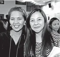  ??  ?? New graduate Councilor April Marie Dayap (right) together with colleagues.