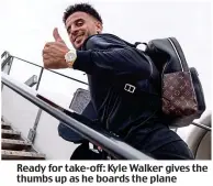  ??  ?? Ready for take-off: Kyle Walker gives the thumbs up as he boards the plane