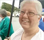  ?? Photo by Dave Woods ?? Carol Gillean, a Springdale resident, counts on the Northwest Arkansas Food Bank mobile pantry to make her fixed income go farther every month.