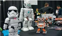  ?? — AFP ?? UBTECH robots including the First Order ‘Stormtroop­er’ and the Amazon Alexa voice assistant-enabled ‘Lynx’ are seen during a CES preview event in Las Vegas.
