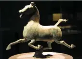  ?? PROVIDED TO CHINA DAILY ?? Han Dynasty bronze “Pacing Horse Poised on Swallow with Wings Outstretch­ed” could hold secrets.
