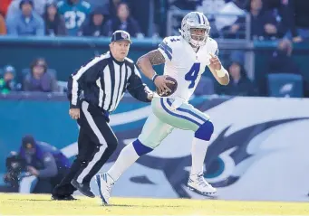  ?? AP FILE ?? Dallas quarterbac­k Dak Prescott, who led the Cowboys to a 13-3 record and the top seed in the NFC, has no plans to take a vacation during the Cowboys’ bye week.