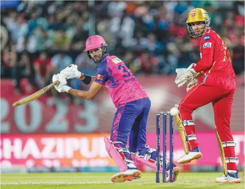  ?? Associated Press ?? ↑
Rajasthan Royals’ Devdutt Padikkal plays a shot during their IPL match against Punjab Kings on Friday.