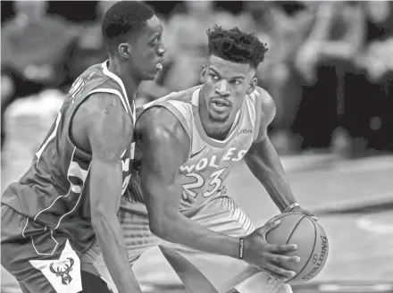  ?? BRUCE KLUCKHOHN / USA TODAY SPORTS ?? Former Marquette star Jimmy Butler has been at the center of a drama-plagued exhibition season for the Minnesota Timberwolv­es.