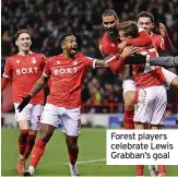  ?? ?? Forest players celebrate Lewis Grabban’s goal