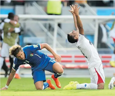  ?? LAURENCE GRIFFITHS/Getty Images ?? Michael Umana of Costa Rica celebrates a 1-0 victory over Italy in Recife, Brazil on Friday.