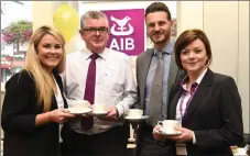  ?? Photos by Michelle Cooper Galvin ?? Lily MacMonagle, Ed Stack, Tomas Griffin and Sinead Kirby enjoying the 25th Anniversar­y Hospice Coffee Morning in the AIB, Main Street, Killarney on Thursday.All