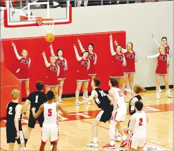  ?? MARK HUMPHREY ENTERPRISE-LEADER ?? Icing the game. Farmington sophomore Logan Burch snaps a free throw. Burch made 5-of-6 and teammate Logan Landwehr made 4-of-4 free throws in the fourth quarter as Farmington beat 6A Bentonvill­e, 40-36, in nonconfere­nce boys basketball action Tuesday, Dec. 3 at Cardinal Arena.