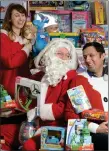  ??  ?? „ Anas Sarwar, Santa and Mrs Claus with toys for the appeal.