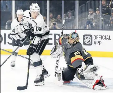  ?? John Locher Associated Press ?? KINGS FORWARD Tanner Pearson tries to get the puck past Vegas goaltender Marc-Andre Fleury during the first period. Fleury made this save and 29 others for his 11th career playoff shutout.