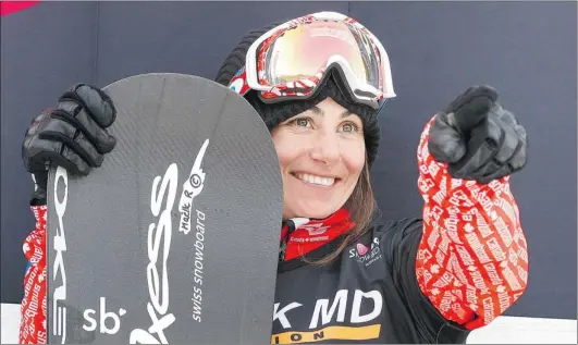  ?? MATHIEU BELANGER / REUTERS ?? Canada’s Maëlle Ricker celebrates after winning the women’s Snowboardc­ross FIS World Cup competitio­n in Stoneham, Que., Tuesday.