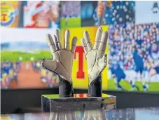  ??  ?? Marshall’s iconic gloves will soon be going on display.