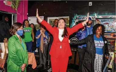  ?? Brontë Wittpenn/The Chronicle ?? Oakland mayoral candidate Sheng Thao greets supporters during an Election Night watch party.