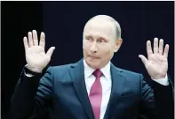  ??  ?? Russian President Vladimir Putin gestures as he speaks to journalist­s following a live nationwide broadcast callin in Moscow on Thursday. (Reuters)