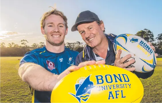  ?? Picture: Cavan Flynn. ?? Bond University Aussie rules player Nathan Thomas with his father Ray.