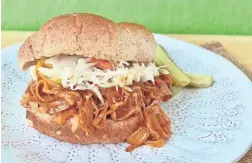  ??  ?? Jackfruit barbecue sandwich. cup vegetable broth cup barbecue sauce teaspoon salt Freshly ground black pepper 2 teaspoons apple cider vinegar
Place a large skillet on medium heat. Pour the oil into the hot pan. Add the jackfruit, onion and garlic and...