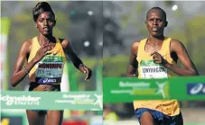  ?? /AFP ?? Crossing the finish line: Purity Rionoripo, left, and her husband Paul Lonyangata, hit the tape to make it a double win for Kenya at Sunday’s Paris marathon.