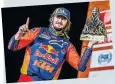  ?? ?? WINNER Toby Price celebrates Dakar victory