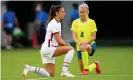  ?? Shopland/Shuttersto­ck ?? USA’s Alex Morgan and Sweden’s Hanna Glas take the knee before their football match at Tokyo Stadium. Photograph: Dave