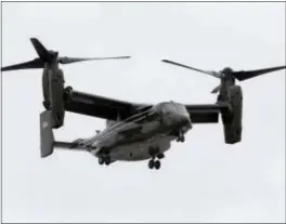 ?? WILFREDO LEE - THE ASSOCIATED PRESS ?? In this 2015 file photo, a Marine Corps MV-22 Osprey comes in for a landing at Miami Internatio­nal Airport before a presidenti­al visit, in Miami. Search and rescue operations were underway for three U.S. Marines who were missing after their Osprey...