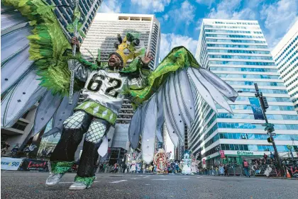  ?? JOSE F. MORENO/THE PHILADELPH­IA INQUIRER PHOTOS ?? Philadelph­ia’s Mummers Fancy division “Fly Eagles Fly” strut in the parade on Sunday in Philadelph­ia.